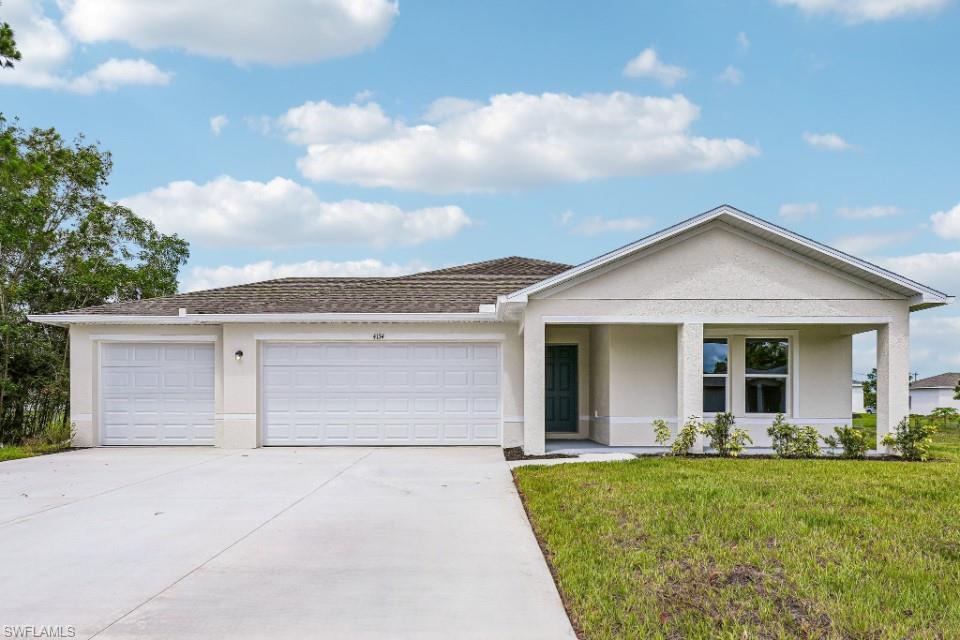 Discover modern living with the Biscayne Plan a charming single-story home. The open design seamlessly connects the Living, Dining, and Kitchen areas. The chef’s dream kitchen features sophisticated cabinetry, elegant quartz countertops, and stainless steel appliances, including a smooth-top range, microwave hood, and dishwasher. The expansive primary suite offers a private bath with dual vanity sinks and a spacious walk-in closet. With three additional bedrooms, a whole secondary bath, and a THREE-CAR GARAGE, this home is perfect.. Energy-efficient Low-E insulated dual-pane vinyl windows and a one-year limited warranty ensure comfort and peace of mind. Select homesites provide additional privacy and showcasing mature pine trees, cabbage palms, and abundant wildlife—perfect for nature lovers seeking a peaceful retreat. Located near Charlotte Harbor Preserve State Park, Florida’s third-largest state park that includes shoreline, mangroves, and estuaries, homeowners enjoy easy access to kayaking, hiking, fishing, and birding.