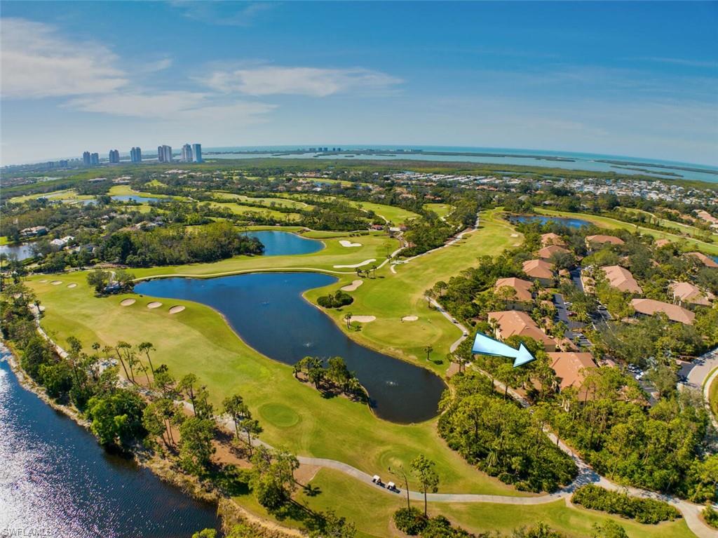 C8479- Sawgrass Point location is ideal. Set back in a quiet, serene area of Pelican Landing. This is a 3 bedroom, 2 bath END unit condo with a detached carport with storage area. The home offers plenty of windows and kitchen is open to the dining room and great room with clear views to the outside. Situated on the golf course and lakes. Community pool is an easy stroll away. A/C 2020, Washer 2022, Dryer 2020, Garbage disposal 2023, Kitchen faucet 2023. Pelican Landing, located west of 41, offers outstanding amenities including Fitness Facility, Pickleball Courts, Tennis Center, Kayak/Canoe Park, Bocce Ball, Sailing Center and Private Beach Club. Pelican Landing's Golf Course, The Nest, has 2 Tom Fazio golf courses. Membership is optional. Near Shopping, Dining, and Airport.