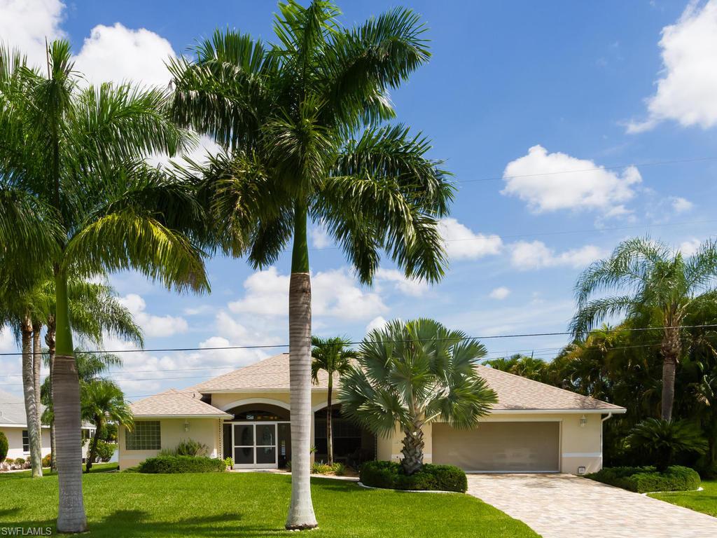 WOW what a Beautiful Home located on Lake Saratoga! Large screened in lanai has you walking through etched double doors to a dramatic view of the lake. Spacious master suite with a suite/Den/Nursery area, spacious walk in closet, bathroom is complete with whirlpool jetted tub, enlarged enclosed shower and dual sinks. Crown moldings accent the ten foot ceilings. Kitchen has granite with energy efficient high end stainless steel appliances and overlooks the gathering room with wet bar. Split bedrooms are joined by the second full bath with glass enclosures and designer sinks. Another full bath provides access to the covered lanai and enclosed pool. Pool is solar heated and includes a soothing spill over waterfall. Large laundry area. Oversized 2 car garage. Large cantilever dock allows access to watersports, kayaking, fishing, and more.