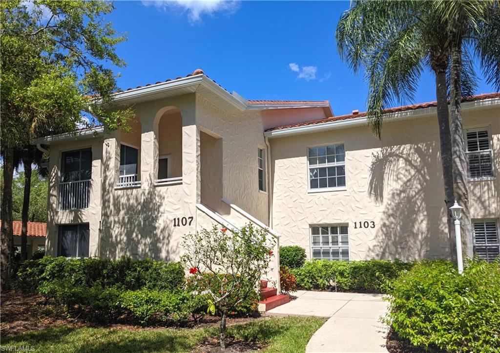 Indulge in the ultimate Naples lifestyle with this stunning first-floor, end-unit residence in the sought-after Tuscany community within the prestigious Vineyards. Enjoy breathtaking water views from your expansive, glassed-in lanai, perfect for year-round relaxation and entertainment. The expansive living and dining rooms offer generous space for gatherings and everyday living. Granite countertops adorn both the kitchen and bathrooms, creating a sophisticated ambiance. Roomy bedrooms feature large walk-in closets, ensuring ample storage and privacy. Access the community clubhouse with a heated pool and spa, ideal for relaxation and socializing. Close proximity to Crossroads Market, featuring Publix, Walgreens, as well as Physicians Regional Hospital. Quick access to the interstate highway. Enhance your lifestyle with optional membership to the Vineyards Country Club, offering golf, tennis, dining, and more. This property offers the perfect blend of luxury, convenience and tranquility.
