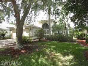 Enjoy gorgeous sunsets overlooking a lake and the 18th hole every evening! Heritage Greens in North Naples is a beautiful golf course community with no golf memberships or monthly minimums. Located in walking distance of A+ rated Laurel Oak Elementary School. This 2 bedroom with a den, large enough to serve as a bedroom, boasts a truly open floor plan. The home is accented by pocket doors, tile floors, and wall to wall carpet. The lot has a large orange tree. The lanai has a westerly view over a small pond onto the 18th fairway. The pool and spa promise many enjoyable days and evenings. Heritage Greens offers clubhouse, community pool/spa, fitness center, sidewalks, street lights and is close to beach and shopping.