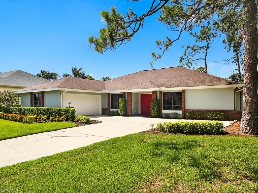 PRICED TO SELL! This recently updated and upgraded model quality ranch offers the finest in cutting edge architectural finishes. Light, bright designer touches will have you thinking you are in new construction while nestled in one of Fort Myers original luxury gated communities. The golf course and water view compliment the expansive newly resurfaced pool and lanai area. A dramatic entry featuring vaulted ceilings, expansive sliding glass doors and beautiful wood flooring invite you into the grand open floor plan. Master suite features a walk in closet, remodeled bath with beautiful marble dual sinks and a spacious walk in shower. Three additional bedrooms provide plenty of room for family and friends with two bedrooms on the opposite side of the living area designed for guest privacy and separate patio. The remodeled kitchen features granite, glass backsplash and stainless steel appliances that home owners love. A huge laundry room with utility sink & built in cabinets for plenty of additional storage. With low HOA fees and a central location just minutes from beaches, RSW airport, shopping, restaurants and entertainment this home has it all. Call and schedule your visit today!