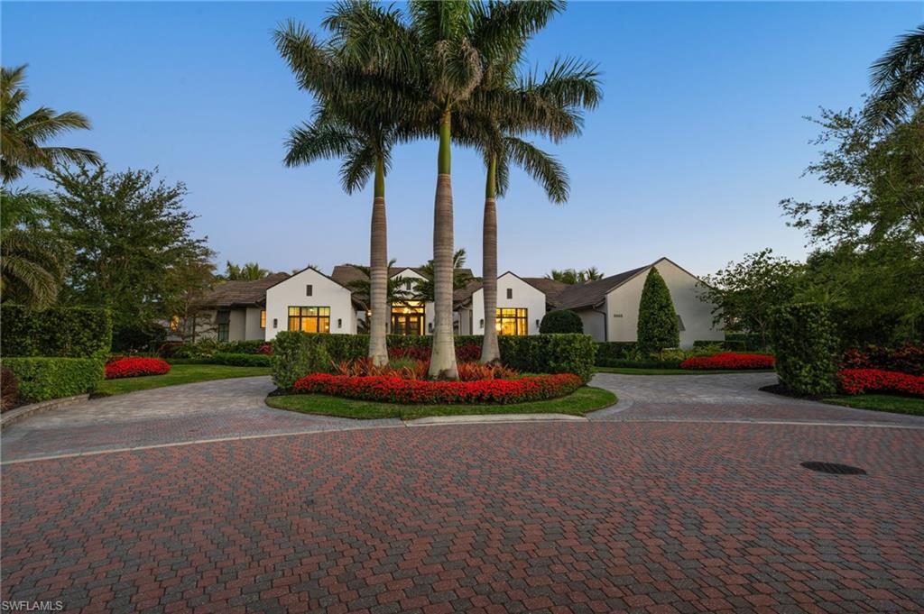 Gorgeous Stock built custom home, CALISA Model, Furnished with absolutely stunning attention to detail throughout. Executive office space with beautiful built ins, gracious kitchen with an abundance of storage and prep space, butler's pantry and exceptional appliances.  Incredible outdoor living offering comfortable covered entertaining area inclusive of an outdoor kitchen, fireplace and built in gas fire pit!  The custom salt-water pool/spa is an inviting retreat and overlooks the lake, golf course and preserve from this almost 1-acre lot.  the 4 car, attached garage is spacious and invites your vehicles and SWFL toys!