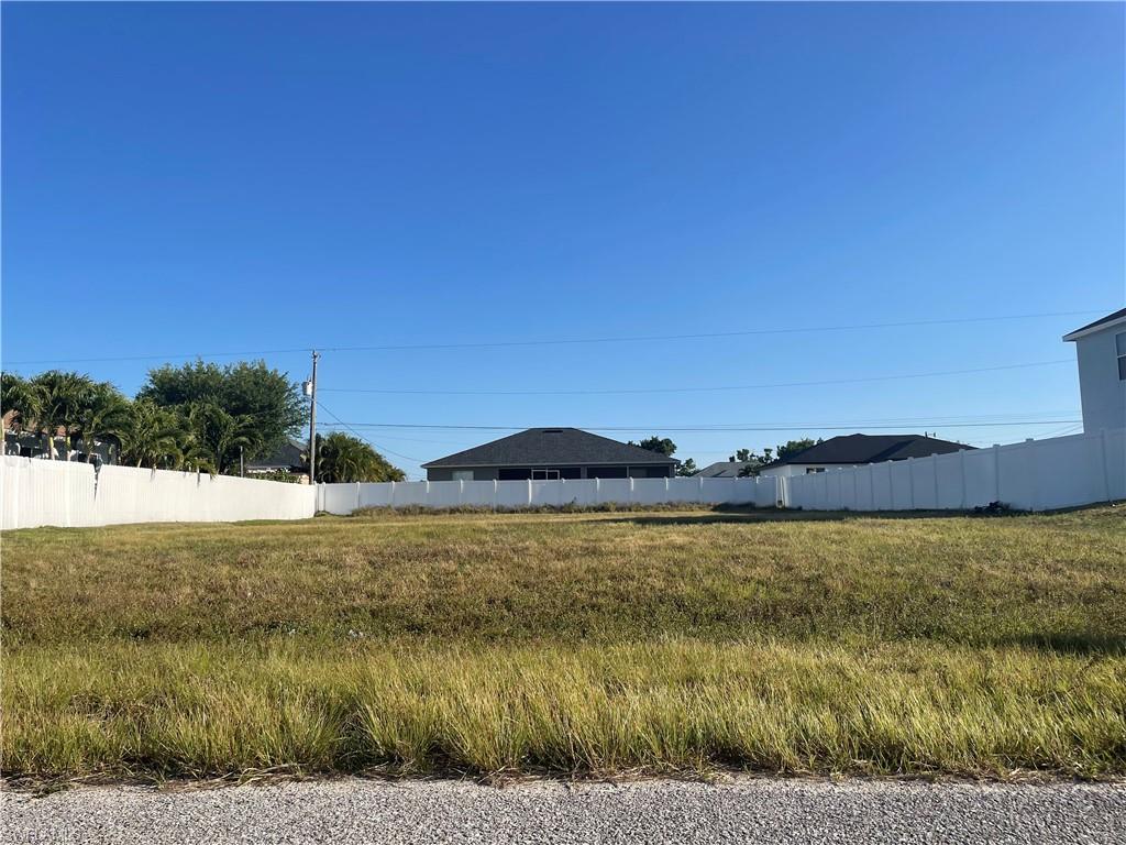 Beautiful residential lot in quiet NE Cape Coral neighborhood. Surrounded by newly built homes, this lot offers convenience with easy access to Pine Island Rd, Del Prado, and Route 41. Target, Publix, Lowe's and BJs are only a few minutes away. Perfect opportunity to build your dream home in a thriving area with abundant shopping plazas and dining options nearby. Buyer responsible for future special assessments.