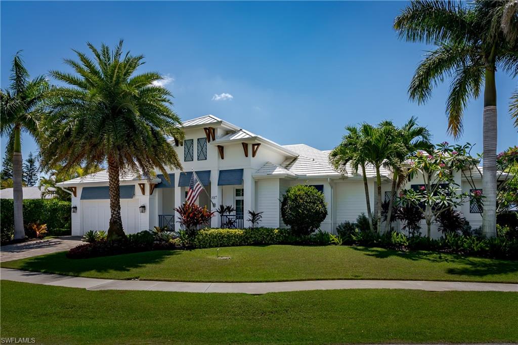 This exceptional home built by AP builders offers a rare opportunity to own a property that feels better than new construction. Every detail has been thoughtfully designed, impeccably maintained, and beautifully upgraded to create a blend of luxury, comfort, and waterfront coastal living. The moment you step through the stunning South American Mahogany door, you are immediately welcomed by breathtaking coastal water views and an elegant open floor plan designed for effortless flow. This spacious 3-bedroom plus den residence connects seamlessly from room to room, creating a warm yet sophisticated atmosphere ideal for both everyday living and hosting guests.
The kitchen, featuring quartz countertops, a gas cooktop, water filtration at the sink, a built-in wine refrigerator, and an inviting bar area connecting the kitchen and dining space — the perfect setting for entertaining. Rest assured, the large walk-in pantry is a bonus storing all your essentials out of sight. The home is equipped with a whole-house Generac generator powered by a 500-gallon propane tank, which also fuels the gas cooktop and outdoor grill, providing both convenience and peace of mind.
Each bedroom offers its own private en suite bath and generous walk-in closets, providing comfort and privacy. The luxurious primary suite is a retreat, complete with expansive walk-in closets, dual vanities, a separate shower, and a soaking tub designed for relaxing after a day on the water.
Functionality meets luxury with a thoughtfully designed laundry room conveniently located near the kitchen and garage. The garage itself offers exceptional storage solutions along all the walls, including overhead lift systems for bikes and elevated tote storage to maximize organization and space.
An integrated Elan OS smart home system has been installed including the Sonos sound system throughout the home.
Step outside into your private waterfront paradise where the pool area showcases lush tropical landscaping, a built-in outdoor kitchen with gas grill, and stunning waterfront views. Recent updates include a new pool pump in 2022 and a new chlorinator in 2026 for the saltwater pool.
The dock and boating facilities are equally impressive, featuring a brand-new dock and new 24,000-pound boat lift, an additional 7,500-pound secondary lift currently outfitted with a toy lift and framed for a bow rider, plus a fish cleaning table, underwater lights, electric, and water service — everything needed for exceptional waterfront living. Don’t miss the side garden for evenings under the stars.
This home is the combination of timeless craftsmanship, modern luxury, and the ultimate coastal lifestyle. Opportunities like this are rare — do not miss your chance to own this extraordinary waterfront retreat which is better than new!