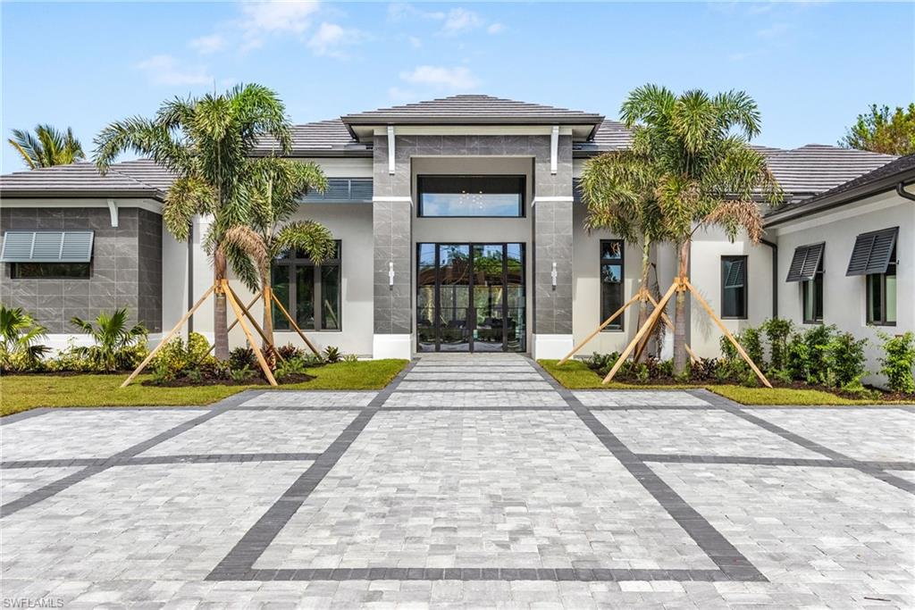 Welcome to Casa Dei Sogni-House of Dreams! An awe-inspiring luxury estate in heart of Pine Ridge, which was also voted best neighborhood in the USA in 2018! This fully furnished single-story residence, furnished by Clive Daniel, features upgrades such as a chef’s kitchen and butler’s pantry featuring Wolf, Sub-Zero, & Bosch appliances. The open floor plan allows for seamless integration of the indoor & outdoor living space, perfect for entertaining. Modern design/decor & high-end finishes are found throughout this breathtaking residence leaving nothing to be desired. Showcasing a bonus/media room, executive office, & full bar with temperature controlled walk-in glass wine room. The outdoor space features a full kitchen, large dining area & plentiful living space. For the car enthusiasts, you’ll appreciate the air conditioned 5-car garage! Other key features are an automatic backup generator and a video security system. Upgrades galore in this estate home, including a guest house! Pine Ridge is conveniently located just minutes from the Waterside Shops, Ritz Carlton, Mercato and only a short drive to downtown and Naples’ white sand beaches, fine dining & world-class shopping.