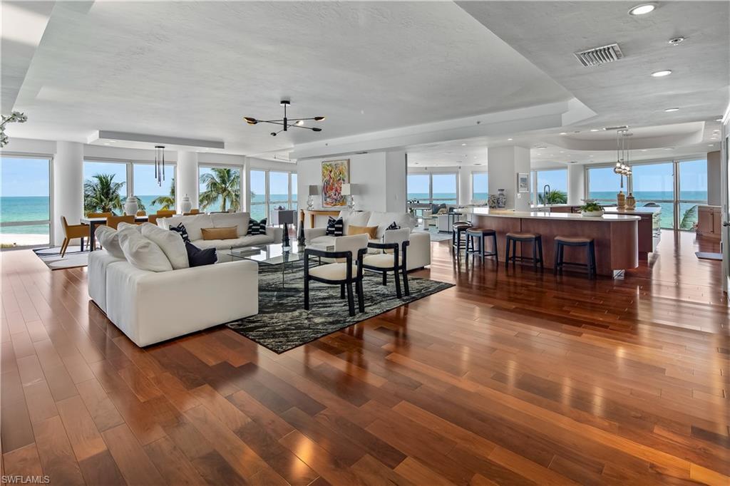 T H E----- E N C L A V E-----R E N A I S S A N C E-----NAPLES MOST UNIQUE GATED BEACH PROPERTY IS IN THE FINAL STAGE OF A 3 YEAR, $11mm REIMAGINATION.  EXQUISITE NEW SOCIAL SPACE WITH EXOTIC FINISHES.  NEW FITNESS CENTER OVERLOOKING THE GULF WITH STATE OF THE ART EQUIPMENT, PERSONAL TRAINING FACILITIES AND GLASS WALLED SAUNAS AND STEAM ROOMS.  NEW RESORT LEVEL POOL WITH 5 STAR TROPICAL FURNISHINGS, SPA, DINING PAVILION AND FIRE TABLE AREA.  NEW TENNIS AND PICKLE BALL FACILITIES.  THE FINAL PHASE, AND CROWN JEWEL, IS NOW UNDERWAY WITH THE CONSTRUCTION OF THE NEW LOBBY, ENTRY CANOPY AND FORMAL GUEST DRIVE APPROACH FLANKED BY PAIRED PALMS.  20 FT CEILINGS, GLASS PYRAMID ROOF AND EXOTIC FINISHES.  INTERIORS BY THE INTERNATIONAL FIRM FDM DESIGNS OF ONTARIO.  ESTATE 3 COMPRISES AN ENTIRE FULL FLOOR WITH PRIVATE ELEVATOR FOYER LEADING TO THE ENTRY GALLERY.  MASTERFULLY RENOVATED IN 2023, THE EXPANDED FLOOR PLAN INCLUDES VOLUMINOUS OPEN SPACES, RICH MAHOGANY WOOD FLOORS WITH FLOOR TO CEILING GLASS WALLS AT THE PERFECT  " BEACH HOUSE "  LEVEL.  NEW WHITE HIS AND HER PRIMARY BATH WITH BESPOKE GLASS WALLED SHOWER AND SOAKING TUB OVERLOOKING THE BEACH.  EXQUSITE GOURMET KITCHEN BY CHICAGO DESIGNER MICK DE GIULIO.  UNSURPASSED POST CARD VIEWS OF THE EVER CHANGING HUES OF THE GULF FRAMED BY TROPICAL PALMS.  PRIVATE AIR CONDITIONED TWO CAR GARAGE.  WITH ONLY 28 RESIDENCES, THE ENCLAVE HAS A FULL TIME STAFF OF 7 INSURING 24/7 SECURITY AND PERSONAL ASSISTANCE FOR ALL YOUR NEEDS.