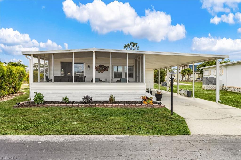 GREAT LOCATION • GULF ACCESS • COMMUNITY BOAT DOCK • BOAT STORAGE AVAILABLE • TURNKEY FURNISHED • LOW FEES Enjoy Southwest Florida living in this turnkey-furnished 2BR/2BA home located in the 55+ co-op community of Coachlight Manor in Fort Myers. This community offers Gulf access with an easy-to-access community boat dock and on-site boat storage available on a first come, first served basis (availability subject to change). This updated home features an open floor plan, updated flooring, granite countertops, stainless steel appliances, and modern finishes throughout, providing comfortable, low-maintenance living. The spacious living and dining areas offer flexibility for everyday use. A large screened lanai (approximately 220 sq ft) provides additional living space, ideal for relaxing or entertaining. Additional features include a covered carport and storage. Coachlight Manor offers low monthly fees of $183, which include lawn care, along with amenities such as a heated pool, pavilion, shuffleboard, and bocce. Conveniently located near Coconut Point, shopping, dining, and approximately 10 miles to RSW Airport and 15 miles to Gulf beaches, this property offers a combination of location, accessibility, boating, and Southwest Florida lifestyle.