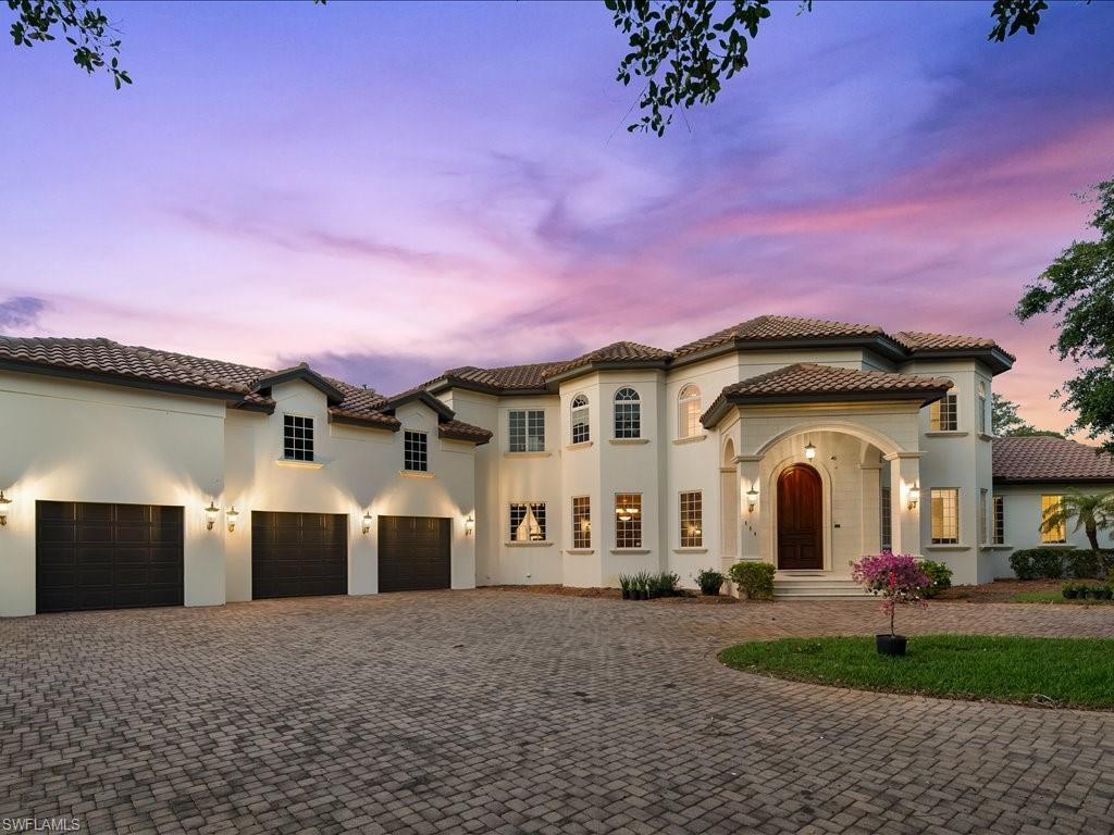 Beautiful custom estate home located in the highly sought-after, centrally located development of Pine Ridge Estates. Situated on a sprawling 1.32-acre lot with lush, mature landscaping, this gorgeous family residence features five bedrooms, plus den, four full, and two and a half baths with a separate large theater and entertainment room all totaling 4,963 sqft under air, including a three-car garage. This home is filled with abundance of natural light and features a family friendly layout that includes a spacious gourmet kitchen, entertaining family room, split bedrooms and a formal dining room with Anderson hurricane impact windows and doors. LED lights and Lutron lighting system have all been recently upgraded. The entire home is run on a reverse-osmosis water filtration system with an underground 1000-gallon propane tank. For those looking for the ultimate community lifestyle in the heart of Naples, amidst a beautiful setting, you have arrived.