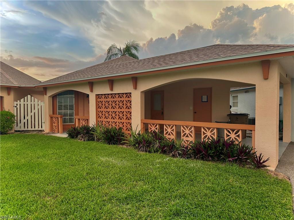 Welcome home to MAGNIFICENTLY REMODELED & freshly painted 2/2 nestled away in a well kept community with (NO AGE RESTRICTIONS) just a few steps to the common heated pool. This open floor plan spotlights an admirable OVERSIZED polished PORCELAIN tile throughout, complimentary Calcutta QUARTZ countertops, custom built gray SOFT CLOSE SHAKER cabinets with wine rack & multiple pantries, an awarding breakfast bar, new appliances, under cabinet lighting, and a desirable tiled entertainment ACCENT WALL. It also highlights a BRAND NEW (2023) dimensional shingle roof, an impressive tiled shower featuring a RAINFALL SHOWER SYSTEM with handheld, dual sink vanity with premium faucets in master, modern panel doors with new hardware throughout, and a screened back lanai patio. It also has recessed lighting, upgraded fixtures, new commodes, spacious closets, and covered parking. Schedule your showing today!