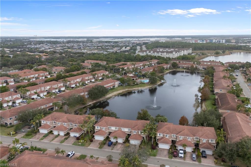 Welcome to this oversized end-unit residence, perfectly positioned on one of the best lots in the community, offering tranquil water views of a serene pond with three fountains. Featuring 3 bedrooms, 2.5 bathrooms, and a 2-car attached garage, this home seamlessly blends comfort, style, and an exceptional location. Inside, you’ll find a fresh, move-in-ready feel with updated paint and carpet (approximately one year old), new appliances, a new water tank, updated HVAC, and updated electrical and plumbing. Furniture is included, with most pieces nearly brand
new, allowing for an effortless transition into the Florida lifestyle. The home also offers custom-made accordion hurricane shutters for added peace of mind. Enjoy spacious living areas filled with natural light while taking in the peaceful water views from your private setting. Whether you’re looking for a full-time residence or seasonal retreat, this property offers the perfect combination of convenience, comfort, and low-maintenance living in a highly desirable location. The garage is thoughtfully designed with three overhead storage bins, two ceiling-mounted
bicycle/kayak hangers, and wall organization systems on both side walls, providing excellent storage and functionality. Outdoor living is a standout feature, highlighted by an oversized front paver patio and a side patio ideal for grilling, all complemented by peaceful water views that create a relaxing backdrop for everyday living or entertaining. Ideally located just 3.5 miles from the airport, and close to Florida Gulf Coast University, beautiful Gulf beaches, shopping, dining, and everyday conveniences, this home offers both privacy and accessibility. Whether you’re enjoying coffee on the lanai overlooking the fountains or heading out to nearby beaches and amenities, this furniture-included property truly delivers the best of Southwest Florida living.