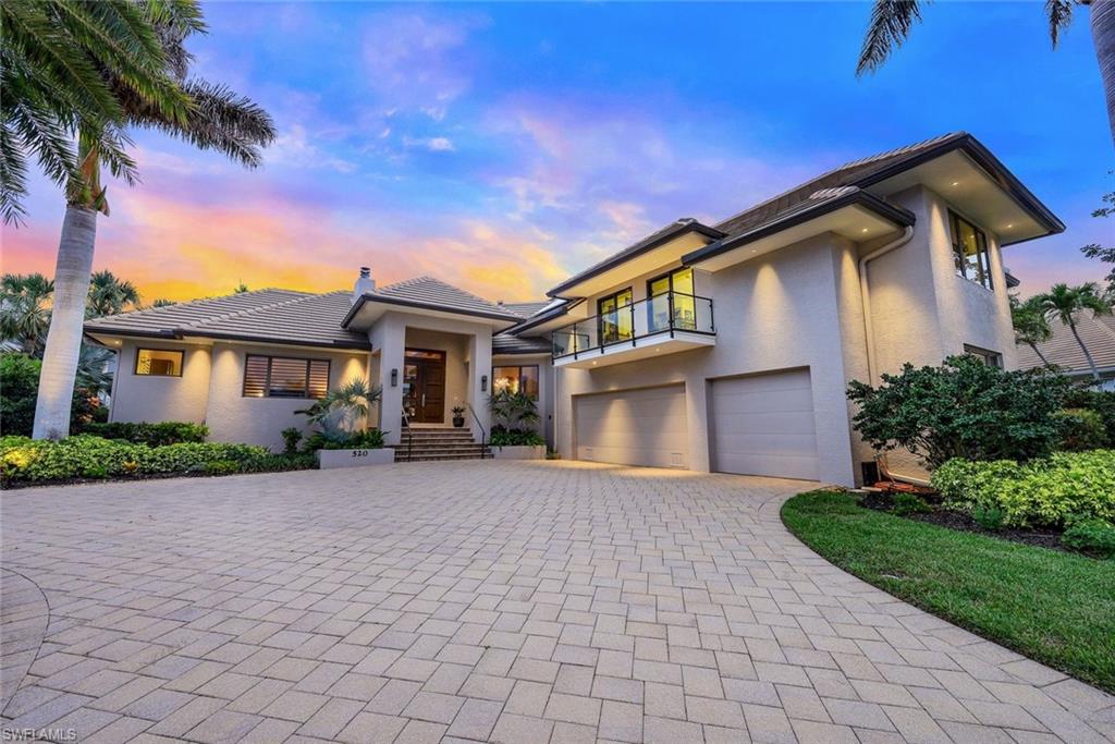 H9916 Absolutely extraordinary custom built home by John Slocum with views out to Roberts Bay. Offering oversized lot with 137’ on the water, southwest exposure, large dock and 2 lifts. Enjoy the outdoors with very spacious lanai, 10 person built in bar and custom designed pool and spa. This amazing home boasts details everywhere you look including unique ceiling details in every room. 4 bedroom, 4 full, 2 half baths plus den. 4th bedroom on the 2nd level currently used as a hobby room and can be converted to a full 2 bedroom, 2 bath guest area. Offering a contemporary style with porcelain flooring this home has an incredible kitchen with Thermador appliances, gas stove, and stunning granite counters. Large pocket sliders allow for views of Roberts Bay from living area and primary bedroom. Solar powered with just a minimal electric bill, this home has state of the art features and exceptional details throughout. Abundance of storage all w/ AC including stand up attic space, walk in crawl space and oversized 3 car garage w/ workshop, industrial sink and extra washer and dryer hook ups.  So much to offer including whole house generator, 4 AC units, 500 gal propane tank.