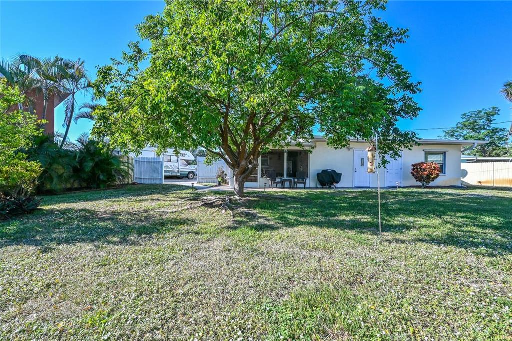Located in the heart of North Naples, this home is in a prime location for shopping, restaurants and the beach.  This 3+ bedroom, 3 bath home has so much to offer.  With a spacious backyard, it is perfect for outdoor activities, bon fires or large gatherings.  It's a must see and is listed below the appraised value.