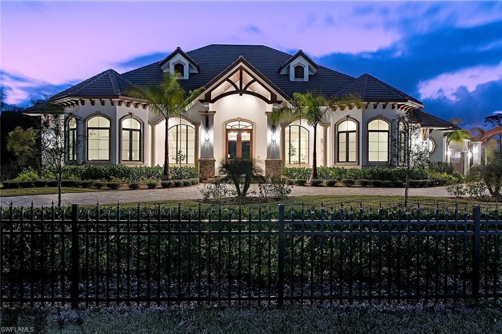 Gorgeous Pine Ridge custom estate just completed. Expansive open floor plan with 5-bedrooms, 5 1/2-baths – all on one level. Featuring timeless classic architecture and exquisite designer finishes throughout. Fully-fenced, double-gated entrance and circular drive with motor court are flanked by two separate 2-car garages making an impressive approach. Light and bright great room with 14' coffered ceilings and intricate trim work is open to large dining space and stunning kitchen. Custom solid wood cabinetry, double island, gas Wolf range, Sub-Zero refrigeration, wine cooler, walk-in pantry, and more. European white oak flooring throughout with designer tile in bathrooms. Master suite with luxurious soaking tub, walk-through shower, double vanities, separate makeup vanity, and dual walk-in closets. Four guest suites all with en-suite baths and custom closets outfitted throughout. Hurricane-impact glass throughout, including automatic, full pocket, sliding doors that lead to expansive outdoor living area with retractable screens, gas fireplace, outdoor kitchen with built-in grill, gas fire pit, plus outdoor bath. Stunning pool with spa framed by gas fire bowls and water feature.