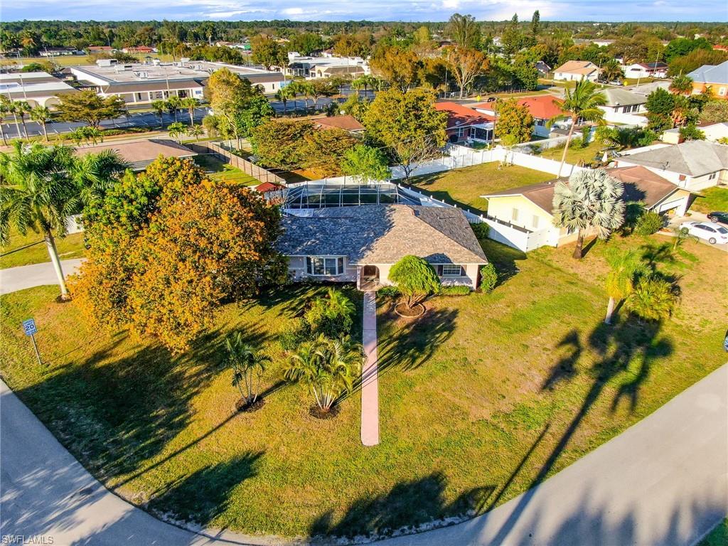 Prime Location!!!  Welcome to Golden Gate City, one of the most desired non-gated  neighborhoods  in Naples Florida. This wonderful well Maintained  Single Family Pool Home, sits on a extended corner lot, fenced back yard, and pool lanai.  Features nearly 1,700 Sq. Ft of  living space, 3 Bedroom,  2 full  bathrooms, updated  kitchen with granite countertops, backsplash, breakfast bar, newer laminated & tile flooring throughout the home, newer crown molding, newer light fixtures,  washer & dryer,  HVAC system 2015 , brand new water heater, roof 2016, pool pump 2020, laundry room, enclosed pool lanai, huge back yard, fence, beautifully landscaped, and much more.... central location close to shopping, dining and public golf course. Walking distance to community park, Golden Gate elementary & Middle School, close to  I-75 and only minutes to Naples' beautiful beaches.