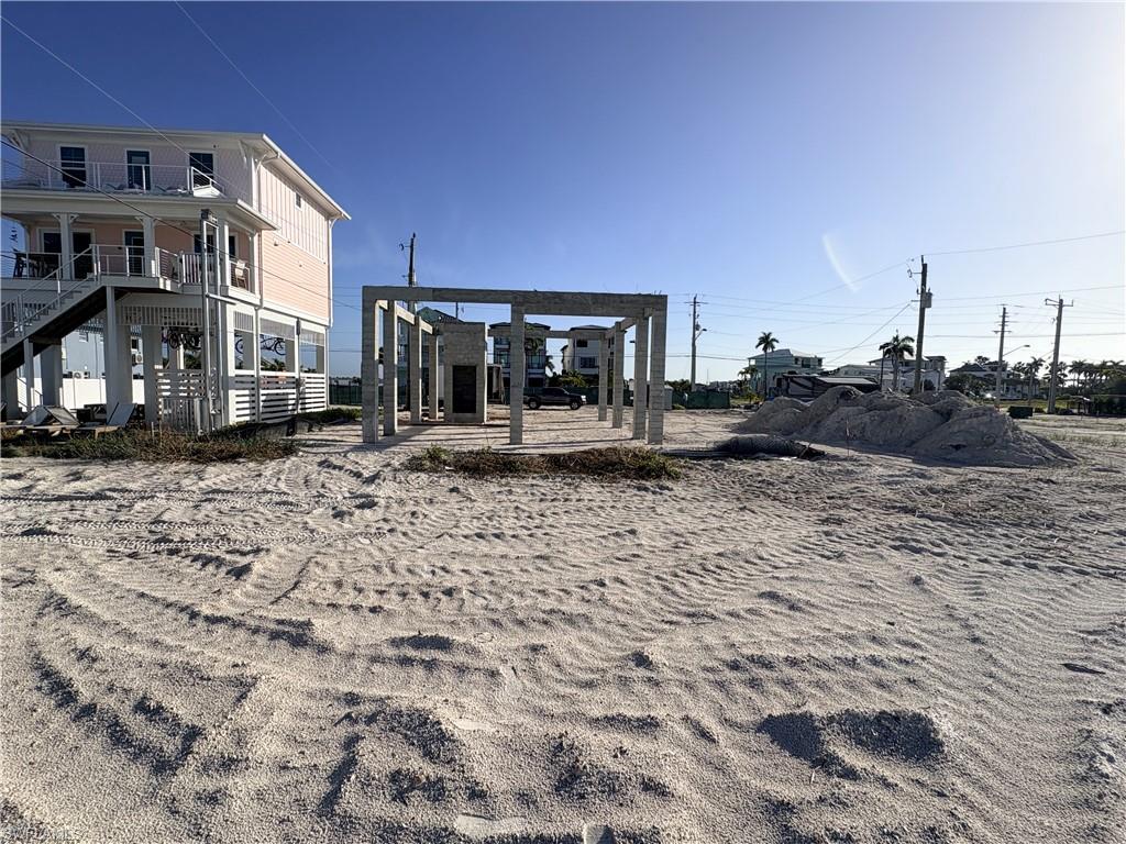 Be one of the first to buy a newly constructed beach cottage in Paradise Point on Fort Myers Beach. Located on the north end of the beach, close to the Pink Shell Resort and just minutes to Time Square and Margaritaville. Easy access on and off the island from this address. The previous Paradise Point Cottages were known for the fun and colorful cottages build in the 60's and 70's and now are being replaced with current code, elevated, hurricane resistant construction, unique and colorful custom beach cottages. The cottage is second in from Estero Blvd and third in from the beach in a row of four lots. This cottage is in the weekly rental area of the island. The cottage is currently under construction with an anticipated completion by the end of this year, 2026.