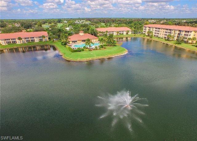POPULAR OSPREY COVE 2/2 + DEN LAKE VIEW CONDO - Prime Location in the heart of Estero. Enjoy a spacious master bedroom with large walk in closet! Storage closet, washer/dryer, all appliances and covered parking space also included. Osprey Cove offers many great amenities including gated entry, resort style heated pool and spa, clubhouse with fitness center, social room, and more! Great location near US-41 right off Estero Parkway. Surrounding area includes FGCU, Coconut Point Mall, Gulf Coast Town Center, Airport, numerous restaurants, and more! LOW HOA fee INCLUDES basic cable, water, landscaping and amenities.