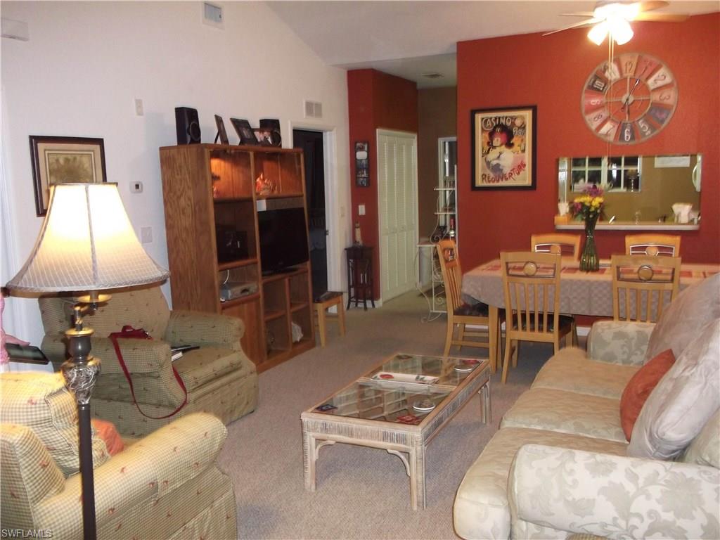 Updated and move in ready is this 3 bedroom 2 bath 2nd floor condo with soaring ceilings.  All furnishings except some personal items of decor are included in the purchase. Screened Lanai is nicely shaded and quiet.  Located in most desirable area of Ft Myers, close to many restaurants, shops and easy access to major roads, airport, beaches and shopping centers. Your pet is welcome.