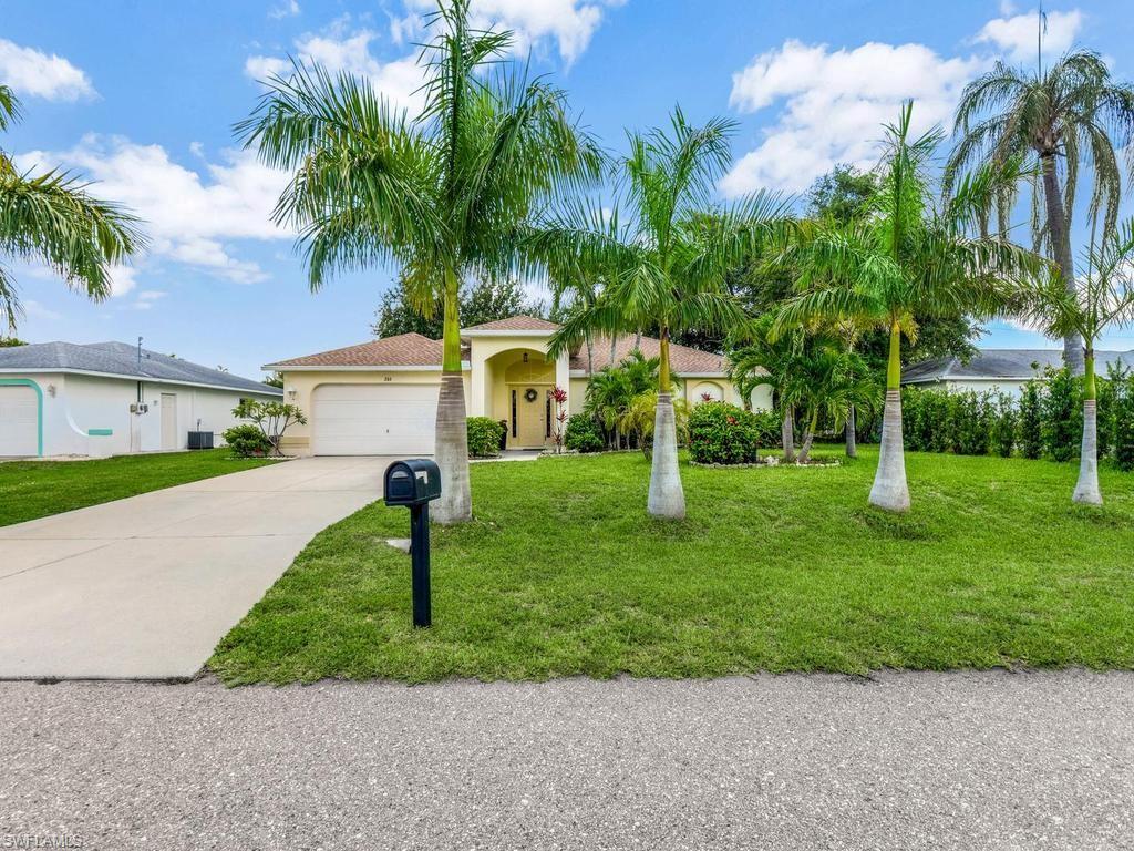 COMPLETELY RENOVATED HOME w/ luxury features throughout. Brand new roof in 2023, new a/c and hot water heater installed in 2021. This home has never has had any hurricane damage. One-of-a-kind home! The open concept designed remodel created a wonderful living space. The great room and kitchen integration flows so comfortably giving you a fantastic area to entertain, large screened lanai, & fenced-in backyard with privacy hedges. Gorgeous luxury touches in both renovated bathrooms and in the gourmet designed kitchen. Split bedroom floor plan w/ the guest bath having an entry door to lanai giving you a pool bath if you so desire to put in a custom built pool. Situated in a highly desired and well established SE Cape Coral neighborhood. All assessments have been paid on city water/sewer. Minutes away from wonderful city parks & marinas, lots of shopping/dining options, and less than 30 minutes from various beaches.