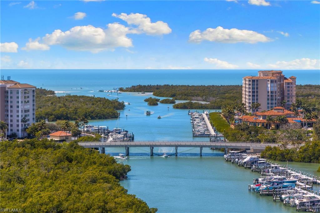 Penthouse residence in Aruba at Cove Towers offering expansive, unobstructed views of Tarpon Bay, Wiggins Pass, and the Gulf of Mexico. This oversized end-unit encompasses the entire west side of the building and lives like a private sky home, featuring 3 bedrooms plus an office and an additional den with wet bar, perfect for entertaining.

Two spacious balconies capture panoramic water views, with both the primary suite and main living areas opening directly to the outdoors. The light-filled floor plan showcases sweeping bay-to-Gulf vistas from the primary bedroom and main living spaces, creating a seamless indoor-outdoor lifestyle.

Each of the three bedrooms offers en-suite baths and walk-in closets, complemented by a convenient powder bath for guests. The well-appointed kitchen includes a walk-in pantry and opens to generous living and dining areas designed for hosting. Additional highlights include a large laundry room, abundant in-unit storage, assigned under-building parking, and a separate downstairs storage closet.

Cove Towers is a private North Naples enclave ideally located near shopping, dining, and entertainment. Optional membership to the Tarpon Cove Club enhances the experience with resort-style amenities including poolside food and beverage service, waterfront alfresco dining, tennis, bocce ball, fitness center, beach shuttle, and an active social calendar.

A rare opportunity to own a premier penthouse with exceptional space, privacy, and panoramic waterfront views.