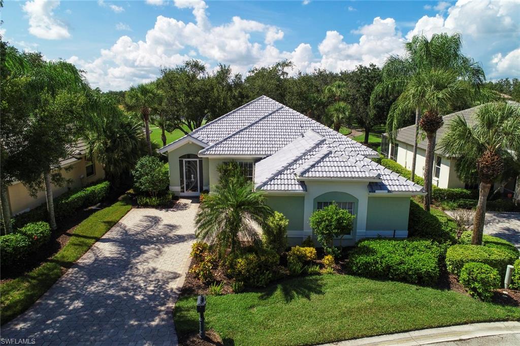 Welcome to Callaway Greens in Gateway.  This is where you will find this immaculate 3 bedroom, 2 bath golf course front home.  The open living dining areas open through sliding doors to a large extended lanai with new portrait screen enclosure with great golf and lake views along the 12th hole of the Tom Fazio Championship course.  Eat-in kitchen with granite tops, all appliances and an adjoining laundry with washer, dryer and utility sink. Large master suite with walk-in closet and bath with dual sinks and separate shower and garden tub. This lovely home has a New Roof (2018); brick paved driveway with side load two-car garage; front entry screened patio and mature landscaping.  The Gateway community is a prime location and close to all Fort Myers has to offer. Come take a look!