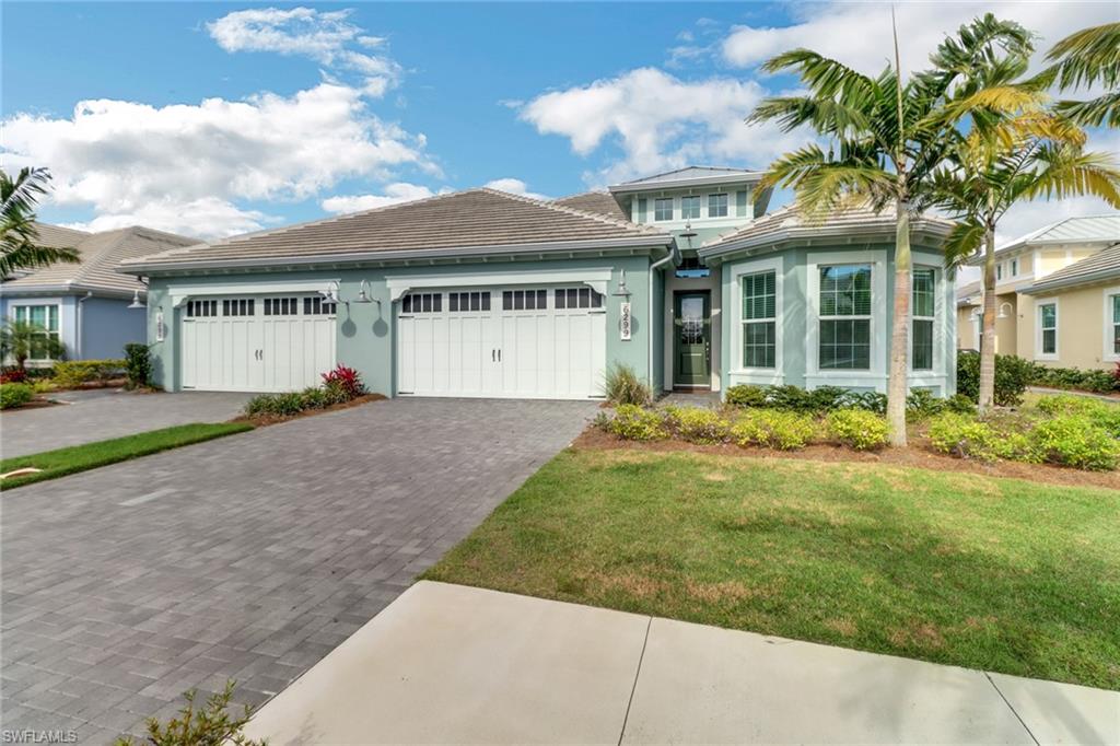 Rented SEASON 2027 | Available June-Sept 2026 at $4,500 | Nestled in the award-winning Isles of Collier Preserve, this contemporary coastal style villa boasts three elegantly furnished bedrooms, a versatile office/den area with pull-out couch, and two beautiful bathrooms. It comes fully equipped with sophisticated furnishings and all necessary conveniences, making it ideal. The outdoor lanai is the crown jewel, providing a serene spot to relax poolside and admire the stunning lakefront sunrises. Tucked away within the community, surrounded by scenic walking and biking trails, this retreat is the ultimate escape. The community offers a wealth of amenities including a clubhouse, both resort-style and lap pools, a state-of-the-art fitness center, and courts for tennis and pickleball. Just 15 minutes away, this prime location ensures easy access to the bustling heart of downtown Naples, famous for its cultural venues, exquisite shopping, gourmet dining, and pristine beaches.