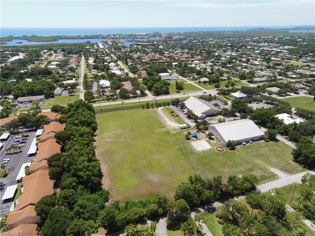 4.13 acre +/- improved commercial lot with development order in place!  Recently rezoned to allow up to 92-bed assisted living facility.  Cleared, filled, utilities to site, storm water retention in place, architectural plans 90% complete. Prime development site in high growth market.  High demand for ALF units in this submarket.  Excellent location - West of US41, close to beaches, surrounded by residential and local retail.  20 minute drive to Southwest Florida International Airport.  Great frontage on Vanderbilt Drive.  Located midway between Naples and Ft. Myers.