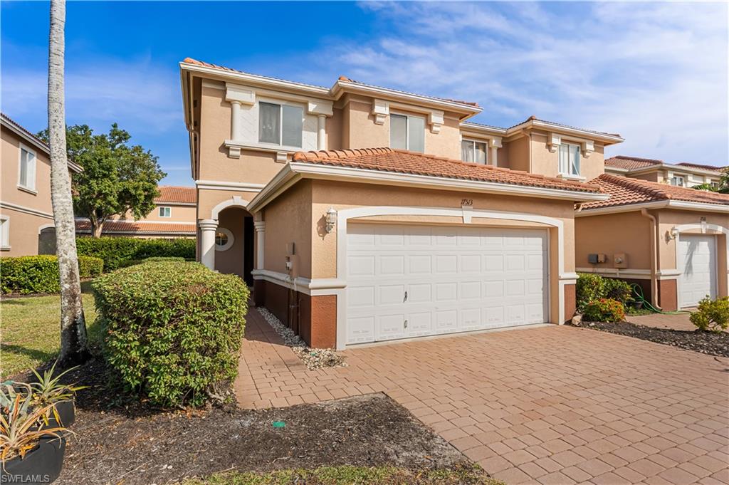 Welcome to Timberwalk, a highly desirable gated community in South Fort Myers, conveniently located off Three Oaks Parkway in San Carlos Park and just minutes from RSW International Airport, Florida Gulf Coast University, Gulf Coast Town Center, shopping, dining, and Southwest Florida's beautiful beaches.

This spacious townhome lives like a single-family home, offering nearly 2,000 square feet of living space with 4 bedrooms, 2.5 bathrooms, and a 2-car garage. The open-concept floor plan features expansive living and dining areas with tile flooring throughout the main level, creating a bright and inviting space perfect for everyday living and entertaining.

The well-appointed eat-in kitchen offers abundant storage, granite countertops, and solid wood white cabinetry. Recent updates include fresh interior paint throughout, brand-new bathroom vanities in the downstairs powder room and upstairs guest bathroom, and a new A/C unit for added comfort and peace of mind.

Retreat to the generous owner's suite featuring a large walk-in closet and a spacious ensuite bathroom complete with dual sinks, a glass-enclosed shower, and a relaxing jetted soaking tub. Enjoy Florida living year-round from the screened lanai, which also includes a large outdoor storage closet.

Timberwalk residents enjoy exceptional amenities including a gated entrance, community pool, recreation center, playground, and beautifully maintained grounds. With low HOA fees, no flood insurance required, and easy access to I-75 and US-41, this property offers convenience, value, and an outstanding location.

Whether you're searching for a primary residence, seasonal getaway, first home, or investment property, this move-in-ready townhome is an opportunity you won't want to miss. Schedule your private showing today! *SOME PHOTOS ARE VIRTUALLY STAGED.