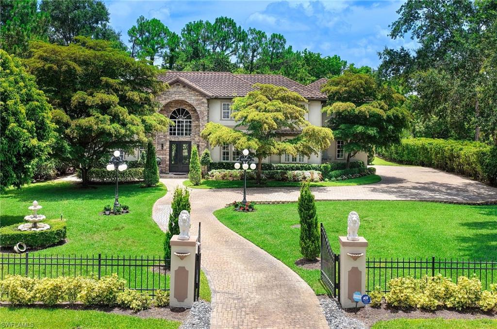 Transport yourself to North Naples BEST KEPT SECRET....QUAIL WOODS ESTATES.  Once entering this Boutique Gated Community of only 62 Single Family Homes you immediately feel the privacy, beauty, and peacefulness of a no thru traffic neighborhood.  Then you have the opportunity to enter private gates and step into one of the most iconic homes being offered in Naples.  No expense has been spared to bring this renovated 4 bedroom  plus den/bonus room and 3.5 bath home into modern today living. Total Sq. ft approximately 6700.  First level primary suite is stunning, solid wood floors, double sinks with onyx lighted vanities, large walk in shower and classic stand alone spa soaking tub. Second level features 3 bedrooms accessed from one of a kind staircase with balcony overlooking lower level and 2 more baths PLUS large BONUS room used for exercise office or playroom ideal for all ages to enjoy. Recent enhancements include, luxury marble flooring throughout, exterior and interior painting, whole house re-wiring, complete new electrical fuse replacement with new wiring throughout, New AC and many new appliances .  The floorplan lends itself to large scale entertaining or intimate family gatherings. Beautiful entry foyer highlights an elegant Waterford crystal chandelier, living room, formal dining room and great room off the kitchen. 4 bedrooms plus bonus room and 3.5 baths.  CHEF INSPIRED KITCHEN is the nucleus of the home.  Oversized solid surface island highlights the room and brings with it the likeness of a Tuscan Farmhouse, Volcan 6 burner Gas Range preferred by Chefs, with large venting hood and fittingly a plaque reads GOOD FOOD-GOOD FRIENDS-GOODTIMES  Memories will be made in this unique kitchen.  Great room flows from the kitchen with stunning stone gas fireplace.   Walk right out to spectacular  outdoor area with pool, upgraded full summer kitchen and retractable awnings for shade all overlooking a perfectly manicured over 1 acre lot. EXTRA BONUS all outdoor furnishings stay with the home.  3 car side loading garage all with separate openers, loads of storage with plenty of space and cameras for added security extra upper shelving installed. Wall mounted water heater, New Well, New Pool pump and New sprinkler system. Both well and county water.  Insanely low HOA fees add to the value of this home and neighborhood which is home to many families with children, professionals and those who crave peace and privacy.  Close to all shopping, RSW airport and 10 minutes from Vanderbilt Beach Take advantage of this opportunity.