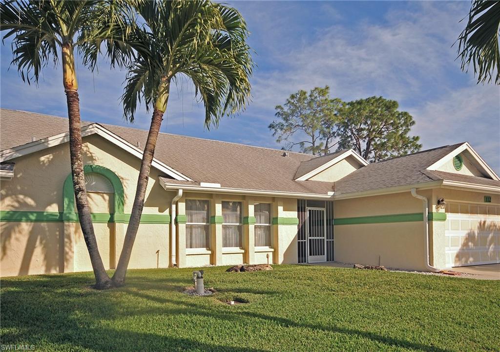 Come see this original Riviera Golf Estates model home- the best single family home buy in the community! Soaring ceilings, lots of natural light and big rooms welcome you in. A bright, inviting 400 square foot Florida room and wet bar say "easy living" and great entertainment for family and friends. Tile and wood laminate flooring with no carpet to replace for easy maintenance. Enjoy the spacious yard with palms and fruit trees ready for picking during the season. Owners added a well for irrigation which keeps the plants fresh and healthy and water bills down. For the convenience of East Naples combined with low HOA fees with a community pool, tennis courts, clubhouse and more, all for under $280,000 be sure to visit this one.