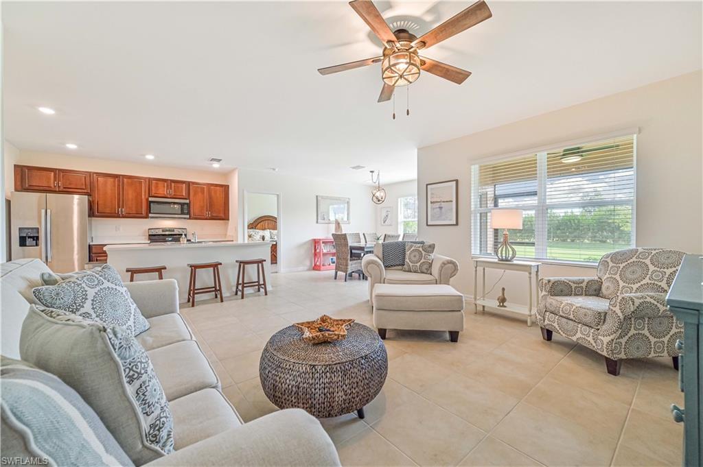 Comfort and Cheer, ALL YEAR! Enter a world of warmth and class as you walk through the door of this TURNKEY home. Featuring high-end fixtures, modern finishes and stylish decor throughout. Tile flooring in common area and carpet in bedrooms. Designed to entertain, the kitchen seamlessly connects to the living room, dining room and the outdoors. A powder room is conveniently located between the two guest bedrooms.  The owner's suite, with walk-in closets, dual sinks, and a large shower, provides a comfortable place to retreat. Escape to your own private sanctuary with the tree-lined spacious backyard oasis and screened-in lanai. Situated in an incredible location, this home is just a short drive to neighboring cities, restaurants, and shopping. MAGNOLIA LANDING offers an array of amenities, social activities, and community events to enhance the life you want to live. There is an 18-hole championship golf course with optional membership, a driving range and an on-site restaurant available. LOW HOA 's, lawn maintenance and leases allowed.  Two bikes and a ladder are included.  Seller is offering seller concessions towards buyers closing costs, prepaids or temporary buy down rate.