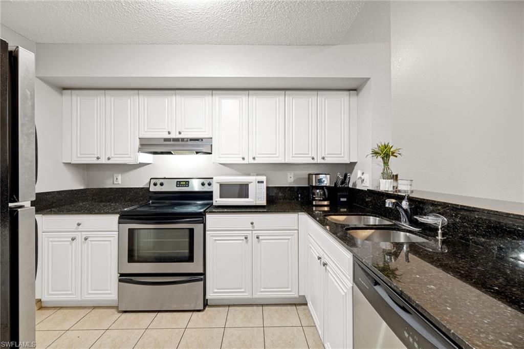 This wonderful 1 Bed+Den/1 Bath 2nd Floor Unit with vaulted ceilings can be yours! Kitchen features lots of storage and black granite counter tops. The condo features Wood Laminate and TILE throughout. You will Enjoy one assigned parking space and also a 1 Car Detached Garage. LOW Fees of $239 a month (includes water/sewer) WOW! This gated community is small scale with a Pool, fitness center, and Playground/Grill area. Central location on Radio Rd near Berkshire Lakes Publix. Wal Mart nearby and schools as well. Great Investment with renter in place until Feb 2022. Great starter or vacation condo as well.