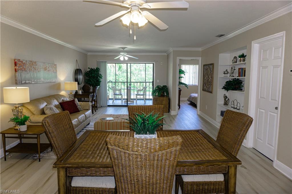 Gorgeous updated 2 bedroom, 2 bath condo in North Fort Myers.  Updates include new vinyl plank flooring throughout, fabulous updated bathrooms and brand new appliances.  This second floor unit has two screened lanais - front and rear to take advantage of the great views and privacy - also enjoy the great cross breezes.  Wonderful location within walking distance to grocery, restaurants and shopping and less than 2 minutes from Downtown Fort Myers.  You could even leave your car at home and take the free trolley Downtown.  Take advantage of our fabulous Florida weather pool side with the large community pool.  1 reserved parking spot and plenty of guest parking.  Great price on a great unit! NO RENTALS ALLOWED.  NO AGE REQUIREMENTS - EVERYONE IS WELCOME.