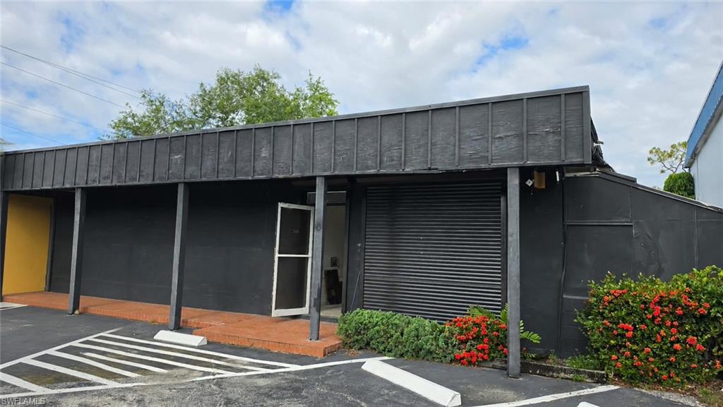 Exceptional leasing opportunity along one of Fort Myers' most heavily traveled commercial corridors. This versatile commercial property offers approximately 4,500± square feet of retail, office, showroom, and warehouse space with excellent visibility and frontage on Cleveland Avenue (US-41).

The flexible floor plan accommodates a variety of business uses, including retail, showroom, service-oriented businesses, contractor operations, specialty trade suppliers, distribution, light assembly, and more. The property features a combination of retail/display areas, office space, storage, and warehouse components designed to support a wide range of commercial users.

The warehouse area includes a 15' x 22' storage loft, providing valuable additional storage capacity while maximizing the functionality of the warehouse floor below. The rear of the building features a covered loading and service area with a double-wide service door and two additional rear entry doors, allowing for efficient loading, unloading, and employee access. The existing configuration may also accommodate the future installation of a roll-up door, further enhancing functionality for warehouse and service-based operations.

The property offers four dedicated parking spaces directly accessible from Cleveland Avenue, with the potential to create three additional covered parking spaces beneath the rear covered loading area.

Positioned on a major commercial thoroughfare with significant daily traffic counts, the property benefits from outstanding visibility, signage exposure, and convenient access to surrounding residential and business districts. This central Fort Myers location places your business in the heart of one of Southwest Florida's primary commercial corridors.