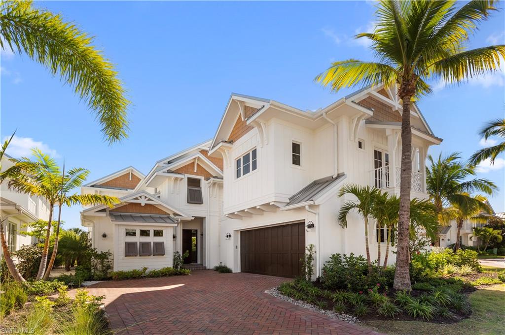STUNNING NEW CONSTRUCTION READY FOR OCCUPANCY. Fully furnished home in Mangrove Bay. Spacious 4,056 square feet under air with 4-bedrooms, 4-1/2 baths, a private entry guest cottage, an expansive 2nd floor family room with an exterior viewing patio deck. PRIVATE COVERED BOAT SLIP INCLUDED. Wood flooring throughout with Ruffino custom cabinetry. Gourmet kitchen featuring Wolf/Subzero appliances (including gas range). Extensive interior finish upgrades. Spacious covered terrace with electronic roll-down screens, outdoor fireplace & grilling station. Exquisite large pool & spa with shell-stone decking. CBS construction, standing seam pure aluminum roof & direct natural gas feed. A generator large enough to run the entire house in the event of a power loss is positioned on a roof deck. Mangrove Bay is nestled along the Gordon River in Old Naples, adjacent to Baker Park, the new Gulfshore Playhouse, 5th Avenue & 3rd Street shopping & dining & the Gulf beaches. Mangrove Bay offers a private luxury Wellness Center for residents with a state-of-the-art fitness room & resident lounge.