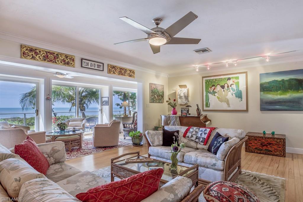 -Dolphin View ... Simply enchanting, cozy old Florida beach style cottage located on over an acre of prime gulf front property with higher elevation. Fully renovated, three bedroom, two full bathroom, sun filled home with panoramic views of the Gulf of Mexico. Maple hardwood flooring and crown molding throughout. Formal living room with gas fireplace and built-in cabinetry. Open kitchen with granite, butler's pantry/laundry room. The master bedroom, living room and kitchen flow easily onto the glass enclosed lanai, which opens to an outdoor deck with additional high screen enclosure off the kitchen area. Outside staircase leads to a lower level screened-in patio with an endless pool, outside shower, pathway to the beach and peaceful serenity garden. Private elevator. Being offered fully furnished with exclusions.
