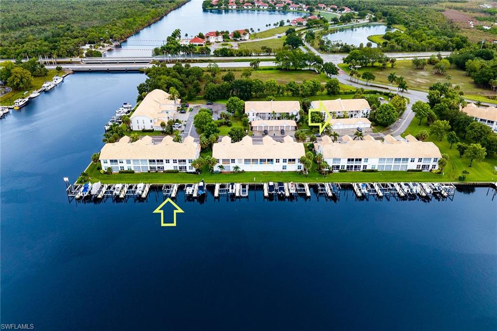 Welcome to 365 Stella Maris Dr N, Unit 2902, an exceptional opportunity to enjoy the Southwest Florida boating lifestyle at a competitive price point in the highly sought-after waterfront community of Port of the Islands. This well-maintained 2-bedroom, 2-bath residence offers comfortable coastal living with a remodeled kitchen, tile flooring throughout, screened lanai, and a single detached garage. The property also features a new HVAC system (2026) and newer water heater. Whether you are looking for a seasonal retreat, full-time residence, or investment opportunity, this property delivers outstanding value in today’s waterfront market. What truly sets this property apart is the included private dock and 10,000 lb boat lift capable of accommodating a vessel with an overall length up to 30 feet. For boating enthusiasts, this is a tremendous opportunity to enjoy direct Gulf access boating without the additional expense of purchasing a separate dock and lift. From your dock, enjoy boating through the breathtaking Ten Thousand Islands with direct Gulf access and no bridges to the Gulf, a paradise for fishing, exploring remote beaches, shelling, and experiencing Southwest Florida’s unmatched natural beauty and wildlife. Since the inception of Port of the Islands, no named storm has ever caused storm surge, thanks to the protection of the Ten Thousand Islands. These islands create a natural buffer and an amazing boating experience. Port of the Islands offers a unique blend of peaceful waterfront living and convenient access to everyday amenities. Located approximately 20 minutes from Marco Island, 30 minutes from downtown Naples, and about 15 minutes from shopping and daily conveniences, residents enjoy the perfect balance of nature, boating, and accessibility. If you have been searching for an affordable entry into the waterfront boating lifestyle with the valuable addition of a 10,000 lb lift already in place, Unit 2902 deserves your attention.