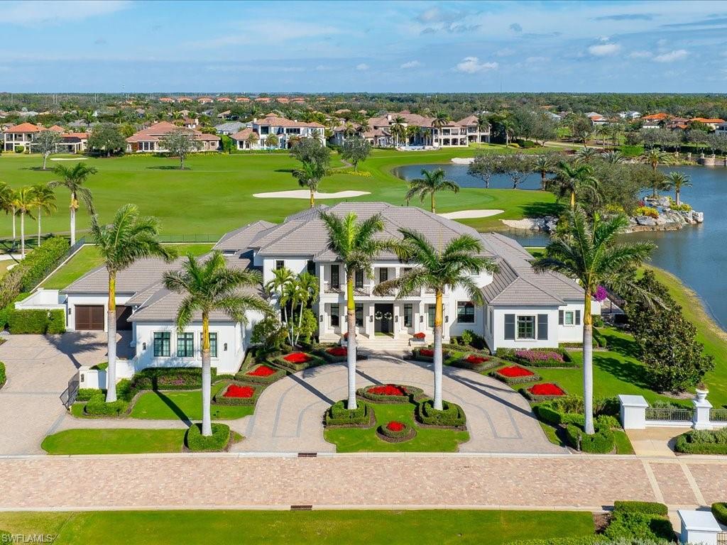 Nestled within the prestigious subdivision of Firenze in the esteemed gated community of Talis Park, this exceptional custom-built estate home epitomizes luxury. Melding refined elegance with meticulous craftsmanship, this residence offers an unparalleled living experience. Step inside to discover a timeless interior design that seamlessly blends sophistication with chic design selections, showcasing intricate details and superior quality craftsmanship. Boasting six spacious ensuite bedrooms, a bonus room, and a separate theater, this spacious layout provides ample space for both privacy and entertainment. The heart of the home lies within the discerning chef's kitchen, complete with top-of-the-line Wolf and Sub-Zero appliances, double islands, sure to make a statement as you enter and a separate butler's pantry, ensuring culinary perfection with every meal. Step outside to discover a tranquil oasis, where the meticulously landscaped grounds and peaceful outdoor living space beckons with its stunning pool and offering expansive views of the golf course. The large backyard provides ample space for outdoor activities, whether for relaxation or entertainment. Indulge in the pinnacle of luxury living at this extraordinary estate, where every detail has been thoughtfully curated to exceed even the most discerning expectations. Welcome home to sophistication, elegance, and unparalleled comfort.