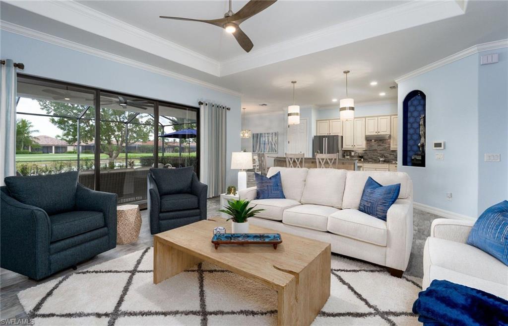 PARADISE PALMS at Bonita National Golf & Country Club is a 3-bedroom-plus-den, 2-bath luxury vacation rental sleeping up to 8 guests. The east-facing screened lanai offers sunrise views over the lake and fairway, with a fully appointed outdoor living space featuring a Viking outdoor kitchen with grill and refrigerator, heated pool and spa, and generous lounge and dining areas. The surrounding community landscaping provides a naturally private, tropical setting. Inside, the open-concept great room flows seamlessly to the lanai through panoramic sliding doors. The chef's kitchen is appointed with stainless-steel appliances, a breakfast bar, and golf course views. A curated bar cabinet with premium glassware is ready for effortless entertaining. The primary suite offers king accommodations, a spa-inspired bath with soaking tub, dual vanities, walk-in closet, and direct lanai access. Two guest bedrooms each feature queen beds and Smart TVs. The private den functions as a dedicated fourth bedroom and remote-work suite, complete with a queen memory-foam sleeper sofa, Smart TV, Wi-Fi printer, and full closet, comfortably accommodating up to 8 guests in total. Complimentary beach gear and three adult bicycles are included. Within 15 miles, Barefoot Beach Preserve, one of Florida's last undeveloped barrier islands, and Bonita Beach offer exceptional Gulf access. Naples' celebrated Fifth Avenue, just 29 miles south, delivers award-winning fine dining, curated art galleries, luxury boutiques, and a vibrant waterfront social scene. Bonita National amenities include a championship George Lewis-designed golf course, Har-Tru tennis courts, a resort-style pool with waterfall, fitness center, spa, multiple dining venues, and new pickleball and bocce courts coming in 2027. (date subject to change) Membership transfer required; details provided upon booking. RSW Airport is approximately 21 miles away, Bonita and Barefoot Beach are 8 to 15 miles away, and Naples' Fifth Avenue is 29 miles away.
