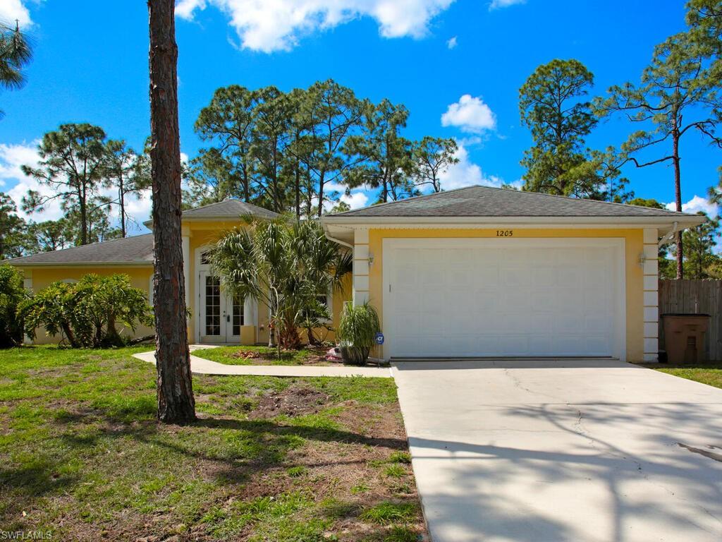 Great opportunity in Lehigh Acres for a half-acre single family pool home on a dead end street. Great location if you love the feel of country living. The home offers 3 bedrooms, 2 bathrooms, a corner lot with a fully fenced in yard. Perfect to play with your kids, let your dog’s run freely, and store your outdoor toys. The split floor plan gives you privacy for you and your guest. The following items were done in 2020. New fence, water heater, septic clean out, pool cage rescreened, pool was drained and cleaned. In 2021 pump for septic tank was installed and the main sewer line was cleaned out. The owner recently had the carpets steam cleaned and new carpet put in the master closest. Home is back on the market due to failed buyer financing. Agents see remarks.