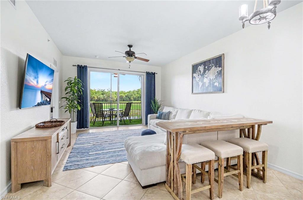 Experience the best of Southwest Florida living from this beautifully maintained second-floor turnkey condominium in the highly sought-after Heritage Bay Golf & Country Club.  Offering 2 bedrooms, 2 bathrooms, and spectacular views of the golf course, sparkling lake, and protected preserve, this residence provides the perfect combination of comfort, privacy, and breathtaking scenery.  Relax on your private screened lanai while enjoying panoramic views and the peaceful sights and sounds of nature.  The second-floor location provides an elevated perspective of the lush surroundings and creates a bright, open atmosphere throughout the home.  Heritage Bay is one of Naples’ premier BUNDLED GOLF communities, offering an exceptional resort-style lifestyle with a 27-hole Lewis-Azinger designed championship golf course featuring the Pine, Cypress, and Oak nines with Tifeagle putting surfaces.  Golf enthusiasts will appreciate the aqua driving range, practice facilities, putting greens, professional instruction, clinics, and a full-service golf pro shop.  A bundled golf membership is included, providing residents with unlimited access to one of Southwest Florida’s most desirable golf experiences.  The recently renovated clubhouse serves as the social heart of the community and features multiple dining venues, including the Main Dining room, Grille Room, and outdoor Terrace Dining.  Residents enjoy an active social calendar with banquets, holiday celebrations, special events, and numerous opportunities to connect with neighbors and friends.   Resort-style amenities abound, including a spectacular community pool, hot tub and spa, poolside Cabana Bar & Grill, outdoor food and beverage service, and expansive sundeck and lounge areas.  Active residents will appreciate six lighted Har-Tru tennis courts, six lighted championship pickleball courts, bocce courts, organized leagues, tournaments, clinics, and social events.  The community also offers a fitness center featuring cardio and strength-training equipment, group fitness classes, and wellness programming.  Additional community features include five satellite neighborhood pools, gated entry, scenic lakes and preserves, walking and biking opportunities, and an unmatched active lifestyle.  Whether you are seeking a seasonal retreat, investment property, or year-round residence, this exceptional condominium offers the opportunity to enjoy the very best of Naples living in a vibrant, amenity-rich golf community.