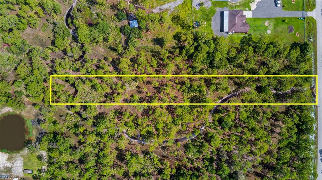 This is a gorgeous lot with tons of privacy, surrounded by mature trees and natural Florida beauty! This 1.14 acre lot offers ample space to design and build your custom dream home or estate, tucked away on a very private street away from every day noise, yet easy reach to Immokalee Rd, and within a short drive to Big Corkscrew Island Regional Park, Winchester Plaza, and the Neighborhood Shoppes at Orange Tree. Don’t miss your chance to secure this beautiful piece of land and create the lifestyle you’ve always envisioned.