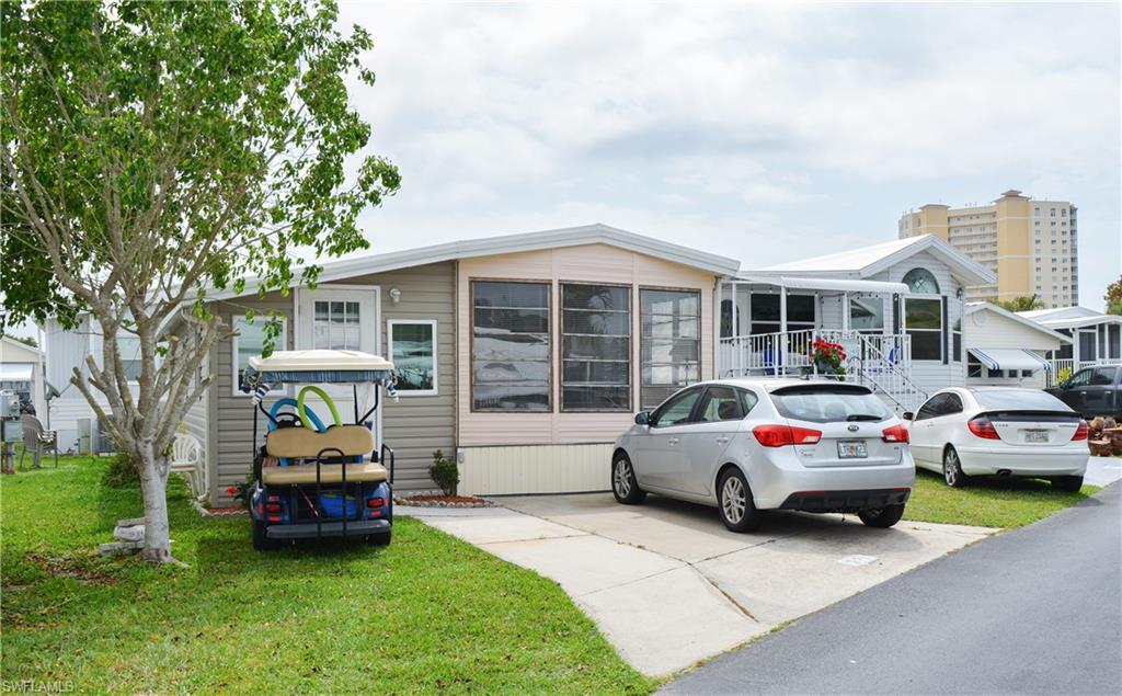 Great 1 bedroom, 1 bath home located in desirable Palmetto Palms. This home is all on one level, brand new flooring throughout and ceiling fans. Spacious Florida room with newer glass windows and Murphy bed! Back utility/storage has washer & dryer hookup and space enough for a possible second bath. The bath has been updated with new flooring, vanity and toilet. The eat-in kitchen is spacious and has full sized appliances.  The home is being sold turnkey. Palmetto Palms is a gated, active, 55 plus community. Tennis, volleyball, biking, swimming, pickleball and more, come enjoy a lifestyle full of fun. It is located between Sanibel Island and Ft Myers Beach. Bunche Beach, a county beach with kayak and SUP launches, is right around the corner. Unparalleled sunsets can be seen from this beach. Act now, this home is competitively priced!