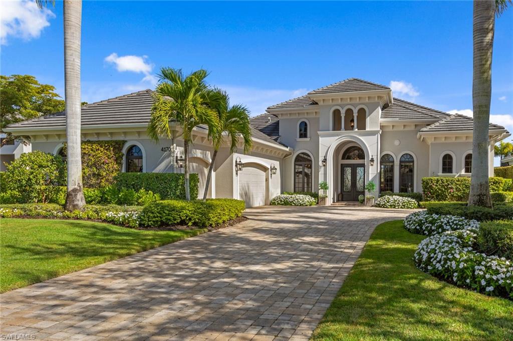 Welcome to 4170 Cortland Way, a beautifully furnished four-bedroom plus den, 4.5-bath single-family home in Naples, uniquely positioned on a premium lot with sweeping water and golf course views. This exceptional residence offers the rare advantage of immediate golf membership availability, allowing you to skip the waitlist and enjoy the full golf lifestyle right away. Designed for comfort and peace of mind, the home features a whole-house generator, alarm and sound systems, impact-resistant windows throughout and electric hurricane shutters. The spacious three-car air-conditioned garage is equipped with built-in cabinetry for additional storage. Indoor-outdoor living is effortless with a spacious lanai equipped with full outdoor kitchen, large gas-heated saltwater pool and spa, travertine lanai and pool deck upgrade, fire pit and additional retractable electric screens. The lanai is ideal for relaxing or entertaining while taking in the serene landscaping and views. Thoughtfully appointed with built-in cabinetry for functionality and additional storage in the primary suite as well as the den. The den also provides flexible space for home office, media or exercise room, or an additional guest retreat. This beautifully maintained home is move-in ready combining luxury, functionality and an unbeatable setting, 4170 offers the best of Naples living inside the gated community Quail West Country Club. Quail West has two championship golf courses, multiple dining options, racquet sports, bocce, a full spa and salon and a 12,000-square-foot fitness center. Conveniently 20 minutes from RSW International Airport, beaches, dining, shopping, the arts and 5th Avenue South.