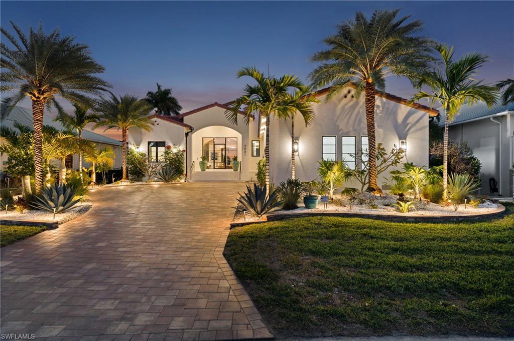 Exceptional riverfront living with modern design and curated finishes. Chef’s kitchen, private primary wing, infinity-edge pool, outdoor kitchen, expansive lanai, and dock with lift deliver the ultimate Southwest Florida waterfront lifestyle.

A rare riverfront estate blending modern architecture with timeless coastal design. This exceptional residence is marketed as a 4-bedroom, 4-bath home and offers a light-filled open floor plan thoughtfully designed for both relaxed daily living and elegant entertaining. Wide-plank white oak flooring, PGT aluminum impact windows and doors, and carefully curated finishes create a refined yet welcoming atmosphere throughout.

The chef’s kitchen is appointed with Wolf and Sub-Zero appliances, a statement walnut waterfall island, and seamlessly connects to a generous Butler’s Pantry featuring double beverage refrigerators and a Pentair filtered water and ice system.

The private primary wing provides a true retreat, complete with custom closet cabinetry, floating vanities, Hansgrohe fixtures, and a spa-inspired wet room highlighted by a teak ceiling and private sitting space. Guest accommodations continue the elevated design, while the distinctive pool bath features a handcrafted concrete ramp sink.

Outdoor living captures sweeping river views from the infinity-edge pool and spa, expansive covered lanai, and fully equipped outdoor kitchen—ideal for entertaining or quiet waterfront evenings. Boaters will appreciate the maintenance-free dock with shore power and fresh water along with a 16,000-lb lift.

An impressive 40’ x 26’ climate-controlled garage with custom storage cabinetry adds versatility for collectors, hobbyists, or additional storage.

This is a residence defined by craftsmanship, privacy, and waterfront lifestyle — a true legacy property.