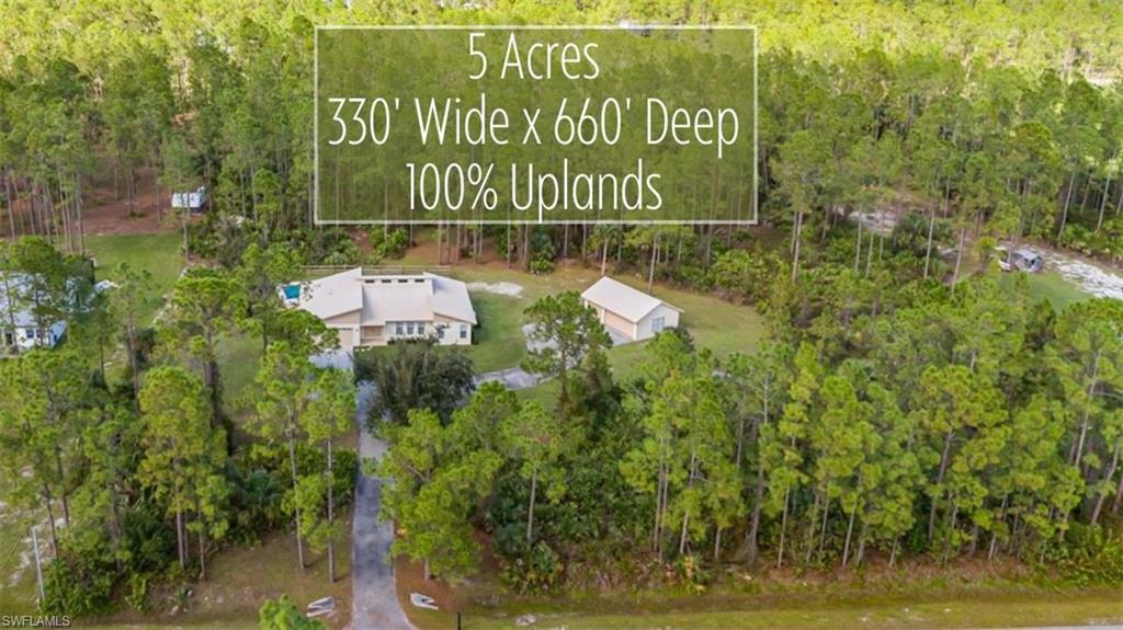 HUGE PRICE IMPROVEMENT! This rare FIVE ACRE, 100% UPLAND ESTATE is ready for its new owners after being meticulously and lovingly maintained by one family! The single level split floor plan has three bedrooms, two bathrooms, in-residence laundry, an extra-deep in-ground pool, attached two car garage and detached three car garage. Its soaring, vaulted ceilings create a spacious and modern feel and the abundance of windows makes this home light and bright all day! Want to expand, add a guest house, maybe a barn? Five acres allows plenty of space for all of that plus animals and toys too! New hot water heater 2024, HVAC 2018, all new stainless steel appliances 2023, new pool filter 2024, and metal roof added in 2008. The lot is a staggering 330 feet wide and 660 feet deep requiring. This home does not require flood insurance! The lot offers the possibility of being subdivided into two lots for a developer investment or family compound.