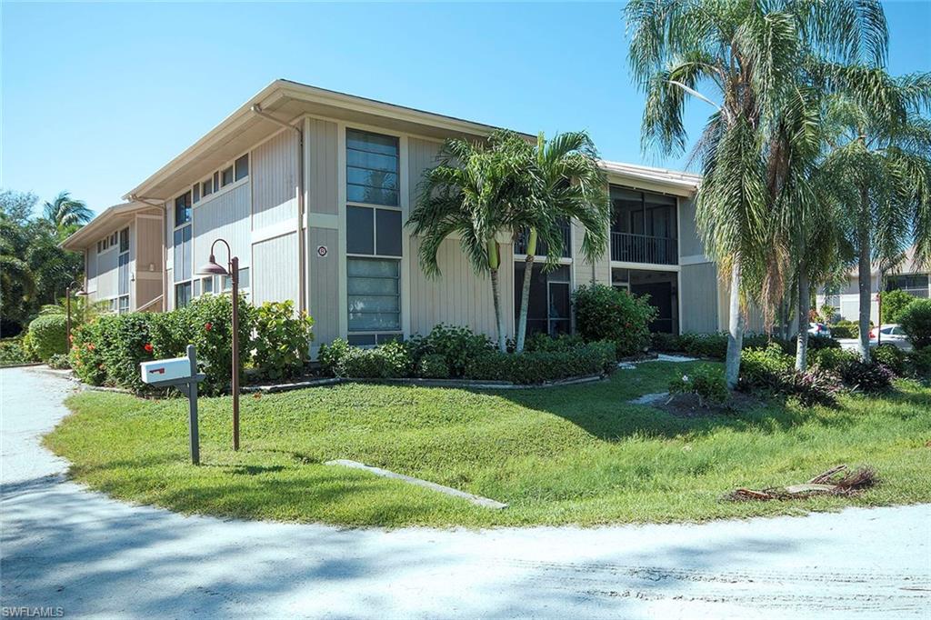 Delightful 2nd floor east-corner unit in building just back from the gulf in tropical Coquina Beach which has just 40 units on Sanibel's convenient east-end. Features include high ceilings in the great room, remodeled kitchen, 2 bedrooms 2 baths, plus spiral staircase to upper loft with additional sleeping spaces, plus a unique crow's nest perch with peek of the gulf. In a seasonal weekly rental program. Community amenities include pool, tennis courts, bbq area, & boardwalk to the beach.