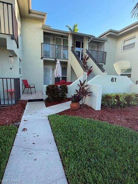 Lovely community in much sought after South Fort Myers. Off the major roadways set back in a private, wooded and peaceful environment.  This unit has been totally renovated.  Kraft Maid cabinetry in the kitchen with quartzite leathered countertops.  Luxury vinyl flooring throughout. 2 very large bedrooms. Both with custom closets.  From master bedroom have your morning coffee on your private fenced patio.  Enjoy grilling in the backyard where you have a beautiful landscaped view.  Community room is perfect for family get togethers. Pool located central to all units.  This is an over 55 community-one occupant must be 55. Located close to shopping, restaurants, ball parks, theaters, beaches and airports.
