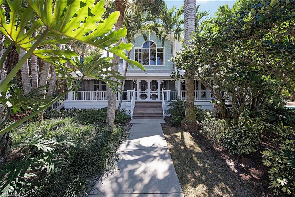 Absolutely one of the most exciting properties to come to the market this season, 78 Broad Avenue South embodies the Old Naples spirit in a way that is nearly impossible to match. Located on the beach block, just a short stroll to the Old Naples Pier and the shops and restaurants on Third Street South, the home allows its owner to enjoy the very best of the Naples lifestyle. This home features 4,295 square feet of living space and a serene outdoor area with abundant privacy surrounding a pool and spa that benefit from western exposure. Covered porches from several rooms add to the ambiance and even give views of the Gulf of Mexico from the master suite and the guest quarters. The white bead board kitchen with marble countertops and Viking gas range will be the centerpiece for important gatherings for years to come. The second-floor master suite has a private sitting area, an ensuite that features a hand-carved subway tile shower and a separate jetted tub.