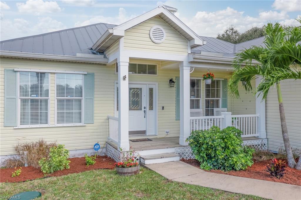 MULTIPLE OFFERS!! Highest and Best by 5:30PM Sunday 2/6! A true Florida charmer with a metal roof and front porch…This 3 bedroom, 2 bathroom home has been updated by the current owners with quartz countertops and glass tile backsplash, Touchless water faucet, under sink RO, New garbage disposal, and Updated appliances in the kitchen, New HVAC condenser and coil with halo, New ceiling fans and light fixtures inside and outside, Updated master bathroom, New sump pump for septic, New softener tanks, Hurricane Shutters, Seamless Gutters, and a New garage door opener and springs and more! The large backyard is accessible from the home through a screened-in walk out deck which leads to the 15ft circular above ground pool. The backyard has a shed for storage and is completely surrounded by a 6 foot vinyl privacy fence with 10 foot wide gate which is perfect to bring in and out all your outdoor toys and wide enough for a boat. Close to I75 and the shops at the Forum. This home has it all, and won’t last long, schedule your showing today! Realtors please see remarks.